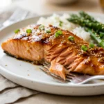 Honey Garlic Salmon: 7 Easy Tips for Beginners 2 honey garlic salmon with glossy glaze on a white plate