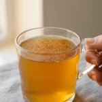 neuro honey protocol drink in a clear glass mug with cinnamon