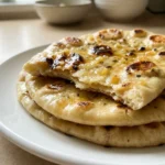 Honey Ginger Naan Recipe: The Easy Stovetop Bread You Need 2 Honey ginger naan recipe stacked on a plate